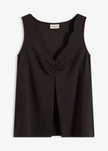 Top z głębokim dekoltem. Czarne topy bonprix, bez wzorów, eleganckie, bez kołnierzyka, bez ramiączek. Za 54,99 zł.
