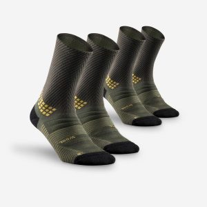 Skarpety turystyczne Quechua Hike 900 długie x2. Zielone skarpetki QUECHUA, bez wzorów, z elastanu. Za 79,99 zł.