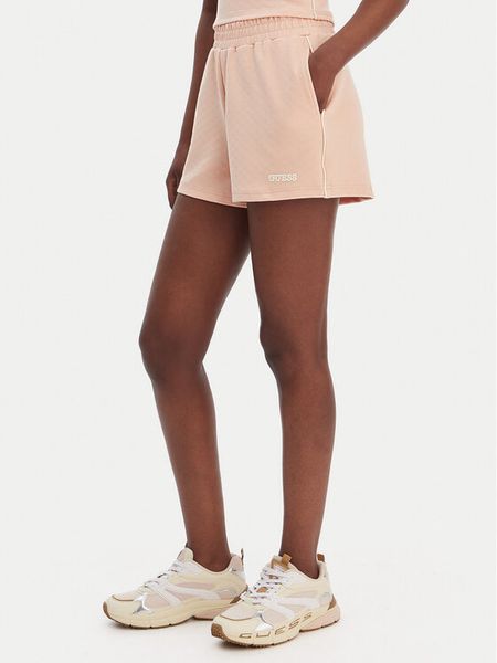 Guess Szorty sportowe V6GD08 K3004 Pomarańczowy Relaxed Fit. Brązowe spodenki sportowe Guess, xxs, z aplikacjami, z syntetyku. Za 264,99 zł.