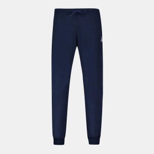 Wąskie spodnie do biegania Le Coq Sportif N°2. Niebieskie rurki le coq sportif, z dresówki. Za 305,00 zł.