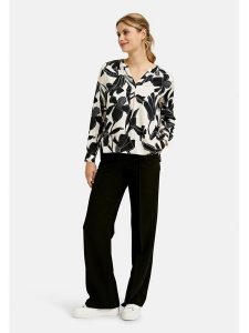 Milano Italy Bluzka w kolorze kremowym rozmiar: 36. Brązowe bluzki Milano Italy, bez wzorów, z wiskozy, bez kołnierzyka, bez ramiączek. Za 173,99 zł.