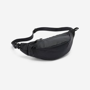Second Life - Torebka nerka hydrofobowa 2 kieszenie - Stan Doskonały. Czarne nerki i saszetki DECATHLON, bez wzorów, z materiału. Za 58,99 zł.