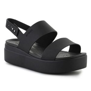 Sandały Crocs Brooklyn Low Wedge 206453-060 czarne. Czarne sandały bez wzorów, z materiału, bez obcasa, na platformie, bez zapięcia. Za 367,32 zł.