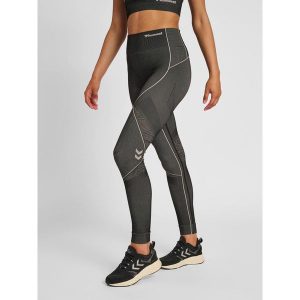 Damskie legginsy mid-rise Hummel MT Mila. Brązowe legginsy Hummel, bez wzorów, z dzianiny, z standardowym stanem. Za 227,50 zł.