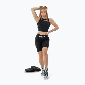 Top treningowy damski NEBBIA Gym Therapy Cropped. Czarne topy NEBBIA, bez wzorów, bez kołnierzyka, bez ramiączek. Za 129,99 zł.