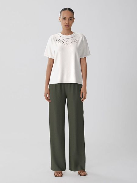 Vila Koszulka "Vipavia" w kolorze białym rozmiar: XS. Białe bluzki Vila, xs, bez wzorów, z bawełny, bez kołnierzyka, bez ramiączek. Za 43,78 zł.