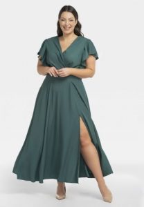 Sukienka kobieca długa z rozporkiem kopertowy dekolt AKSENA butelkowa zieleń. Zielone sukienki KARKO, na studniówkę, l, bez wzorów, z elastanu, bez kołnierzyka, plus size, bez ramiączek, maxi, kopertowe. Za 289,50 zł.