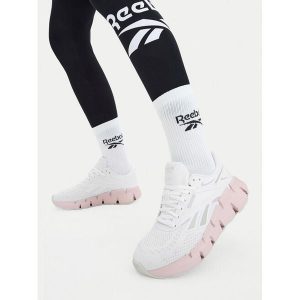 Buty do biegania Reebok. Białe buty sportowe Reebok, bez wzorów, bez zapięcia, do biegania. Za 369,99 zł.