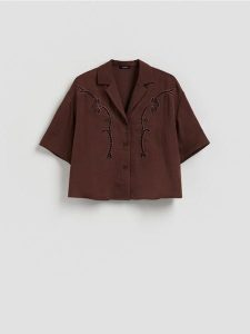 Koszula z wiskozą - ciemnobrązowy. Brązowe koszule Reserved, l, bez wzorów, z tkaniny, bez kołnierzyka, bez ramiączek. Za 149,99 zł.