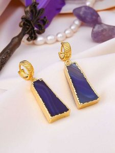 Pierres de Jade Pozłacane kolczyki-kreole z agatami rozmiar: onesize. Niebieskie kolczyki Pierres de Jade, z agatem, pozłacane. Za 43,99 zł.