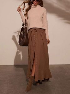 Milan Kiss Spódnica w kolorze jasnobrązowym rozmiar: M. Brązowe spódnice Milan Kiss, na co dzień, m, bez wzorów, z bawełny, midi. Za 243,64 zł.