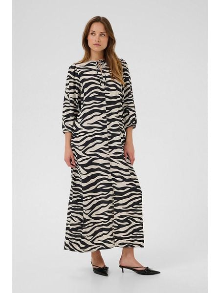 Kaffe Sukienka w kolorze kremowo-czarnym rozmiar: 44. Brązowe sukienki Kaffe, na imprezę, s, bez wzorów, z wiskozy, klasyczne, bez kołnierzyka, bez ramiączek, maxi. Za 113,10 zł.