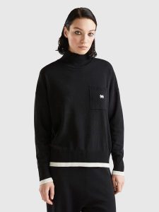 Benetton Sweter w kolorze czarnym rozmiar: M. Czarne swetry oversize Benetton, m, bez wzorów, bez ramiączek. Za 96,60 zł.