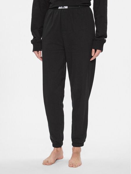 Calvin Klein Underwear Spodnie piżamowe 000QS7085E Czarny Relaxed Fit. Czarne piżamy Calvin Klein Underwear, bez wzorów, z bawełny, bez ramiączek. Za 259,99 zł.