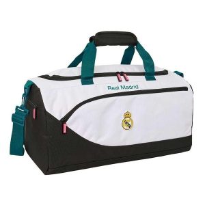 Oficjalna torba sportowa Realu Madryt 2026-27. Niebieskie torby podróżne i sportowe REAL MADRID, bez wzorów, z materiału, na ramię. Za 179,00 zł.