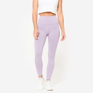 Legginsy fitness damskie Domyos. Fioletowe legginsy NYAMBA, bez wzorów, z bawełny, z podwyższonym stanem. W wyprzedaży za 69,99 zł.