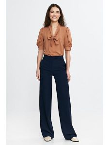 Nife Spodnie w kolorze granatowym rozmiar: 36. Niebieskie spodnie z wysokim stanem Nife, bez wzorów, z materiału, z podwyższonym stanem. Za 164,92 zł.