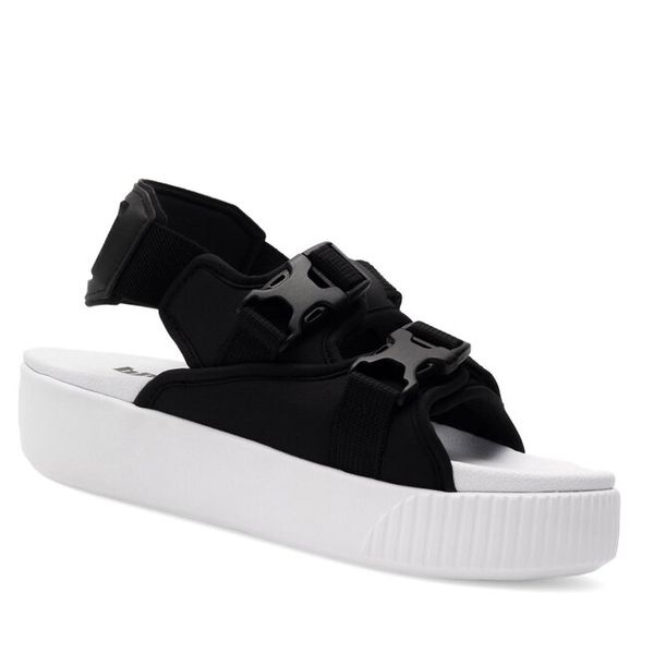 Sandały Puma. Czarne sandały Puma, bez wzorów, bez obcasa, na koturnie, bez zapięcia. Za 229,99 zł.