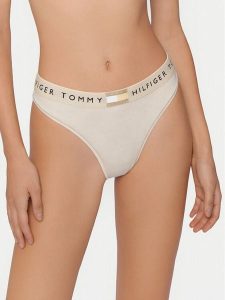 Tommy Hilfiger Stringi UW0UW06039 Beżowy. Brązowe stringi TOMMY HILFIGER, bez wzorów, z bawełny. Za 89,99 zł.