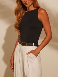 Milan Kiss Top w kolorze czarnym rozmiar: L. Czarne topy Milan Kiss, l, bez wzorów, z bawełny, bez kołnierzyka, bez ramiączek. Za 113,99 zł.