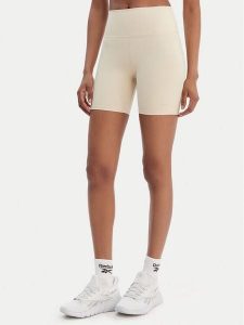 Reebok Szorty sportowe Reebok x Ewa Chodakowska Basia RK25618CCW Beżowy Slim Fit. Brązowe spodenki sportowe Reebok, l, bez wzorów, z syntetyku, na fitness i siłownię. Za 159,99 zł.