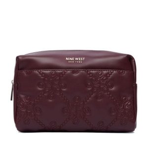Kosmetyczka Nine West. Czerwone kosmetyczki Nine West, bez wzorów. Za 79,99 zł.