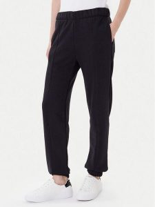 On Spodnie dresowe Club Pants 1WE1005 Czarny Relaxed Fit. Czarne spodnie dresowe On, l, bez wzorów, z bawełny. Za 379,99 zł.