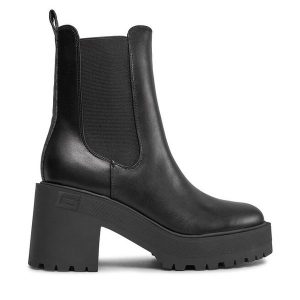 Botki Guess. Czarne botki Guess, z aplikacjami, bez obcasa, na słupku, bez zapięcia. Za 569,99 zł.