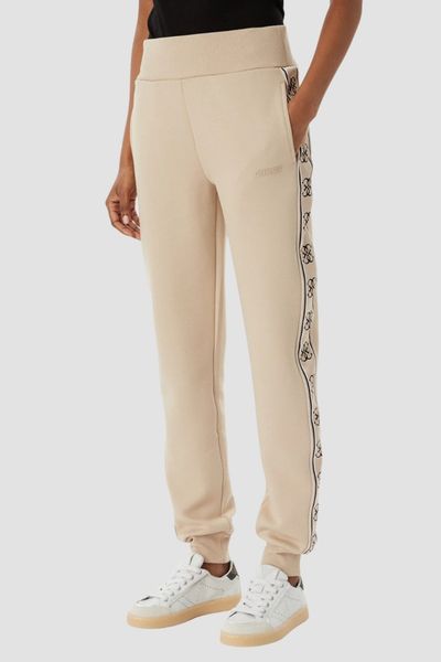 GUESS Beżowe damskie spodnie dresowe z lampasami Britney Jogger, Rozmiar S. Brązowe spodnie dresowe Guess, s, z aplikacjami, z dresówki. Za 489,99 zł.