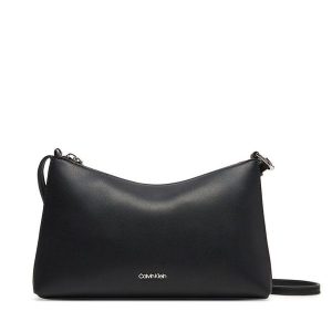Torebka Calvin Klein. Czarne torebki klasyczne Calvin Klein, bez wzorów, bez dodatków. Za 259,99 zł.