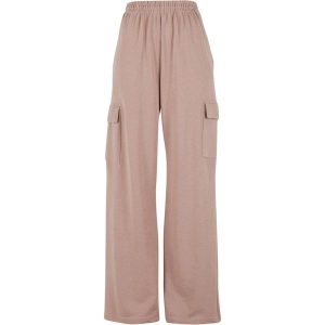 Damskie spodnie dresowe loose fit Urban Classics Light Terry. Czerwone spodnie dresowe Urban Classics, bez wzorów, z dresówki. Za 175,50 zł.