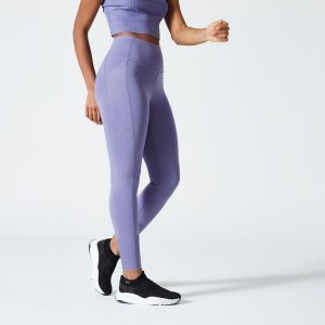 Legginsy fitness damskie Domyos 520. Fioletowe legginsy NYAMBA, bez wzorów, z bawełny, z podwyższonym stanem. W wyprzedaży za 59,99 zł.