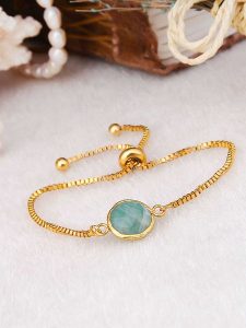 Pierres de Jade Pozłacana bransoletka z amazonitem rozmiar: onesize. Niebieskie bransoletki Pierres de Jade, pozłacane. Za 43,99 zł.