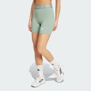 Krótkie legginsy TECHFIT. Zielone legginsy ADIDAS, bez wzorów, z materiału, krótkie. Za 129,00 zł.