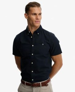 Superdry Koszula Preppy Oxford krótki rękaw z bawełny organicznej. Niebieskie koszule Superdry, xl, bez wzorów, z bawełny, bez kołnierzyka, bez ramiączek. Za 301,95 zł.