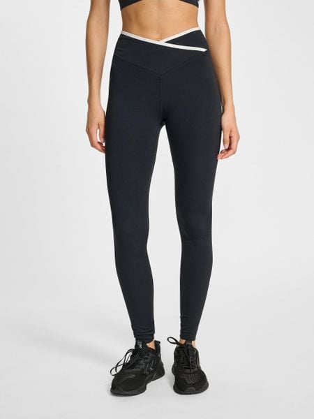 Damskie legginsy z wysokim stanem Hummel Wrap. Czarne legginsy Hummel, bez wzorów, z materiału, z podwyższonym stanem. Za 245,85 zł.
