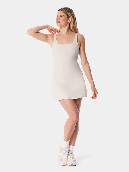 Carpatree Sukienka tenisowa "Balletcore" w kolorze beżowym rozmiar: L. Brązowe sukienki Carpatree, l, bez wzorów, sportowe, bez kołnierzyka, bez ramiączek, sportowe. Za 134,95 zł.