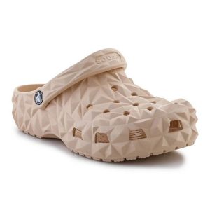 Klapki Crocs Classic Geometric Clog 209563-2DS beżowy. Brązowe klapki bez wzorów, z materiału, bez obcasa. Za 374,47 zł.