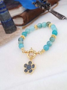 Pierres delicates Pozłacana bransoletka z agatami i perłami rozmiar: onesize. Niebieskie bransoletki Pierres delicates, z agatem, pozłacane. Za 78,84 zł.