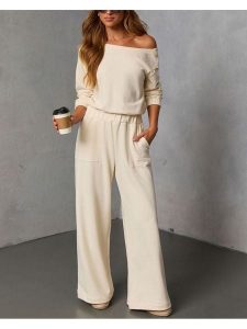 Milan Kiss 2-częściowy zestaw w kolorze beżowym rozmiar: XL. Brązowe spodnie dresowe Milan Kiss, xl, bez wzorów, z dresówki. Za 173,99 zł.