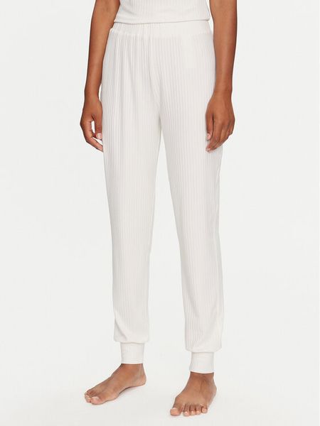 Guess Spodnie piżamowe O3BB00 KBXB2 Szary Regular Fit. Szare piżamy Guess, z aplikacjami, z syntetyku, bez ramiączek. Za 119,99 zł.