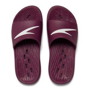 Klapki basenowe damskie Speedo Slides One Piece Af. Niebieskie klapki Speedo, bez wzorów, bez obcasa. Za 89,99 zł.