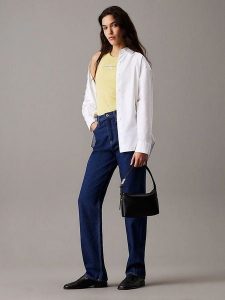 Calvin Klein Dżinsy - Regular fit - w kolorze granatowym rozmiar: W28/L34. Niebieskie jeansy Calvin Klein, z aplikacjami, z podwyższonym stanem. Za 295,99 zł.