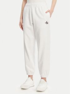 Calvin Klein Jeans Spodnie dresowe Monologo LV047B235G Biały Regular Fit. Białe spodnie dresowe Calvin Klein Jeans, m, bez wzorów, z bawełny. Za 239,99 zł.