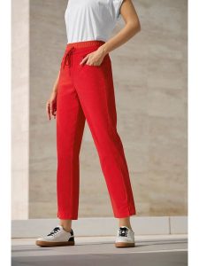 Heine Spodnie dresowe w kolorze czerwonym rozmiar: 40. Czerwone spodnie dresowe Heine, bez wzorów, z dresówki. Za 63,45 zł.