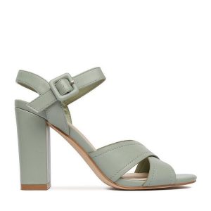 Sandały JENNY. Zielone sandały Jenny, bez wzorów, bez obcasa, na słupku, bez zapięcia. Za 119,99 zł.