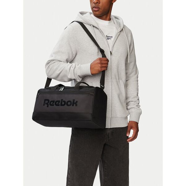 Torba sportowa Reebok. Czarne torby podróżne i sportowe Reebok, bez wzorów. Za 129,99 zł.