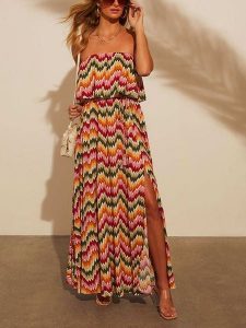 Milan Kiss Sukienka ze wzorem rozmiar: M. Sukienki Milan Kiss, m, bez wzorów, z tkaniny, bez kołnierzyka, bez ramiączek, maxi. Za 169,67 zł.