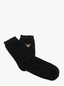 Świąteczne skarpety unisex. Czarne skarpetki Ryłko, bez wzorów, z bawełny. Za 24,99 zł.