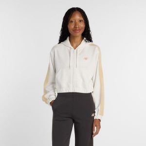 Bluza damska New Balance WJ61B759SST – beżowa. Brązowe bluzy New Balance, s, bez wzorów, z dresówki, z kapturem. Za 299,99 zł.